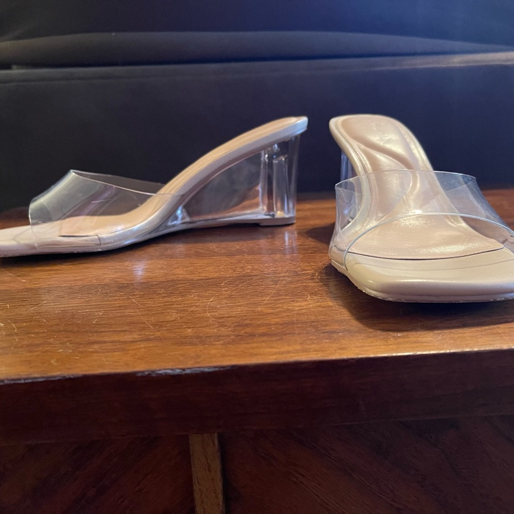 Arromic Clear Wedge Heel Sandal with Square toe slip on. Nude bottom.